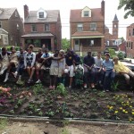 Arsenal Students Plant Flowers